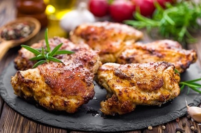Traditionsgeflügel Hähnchenoberkeule mit Haut, ohne Knochen \